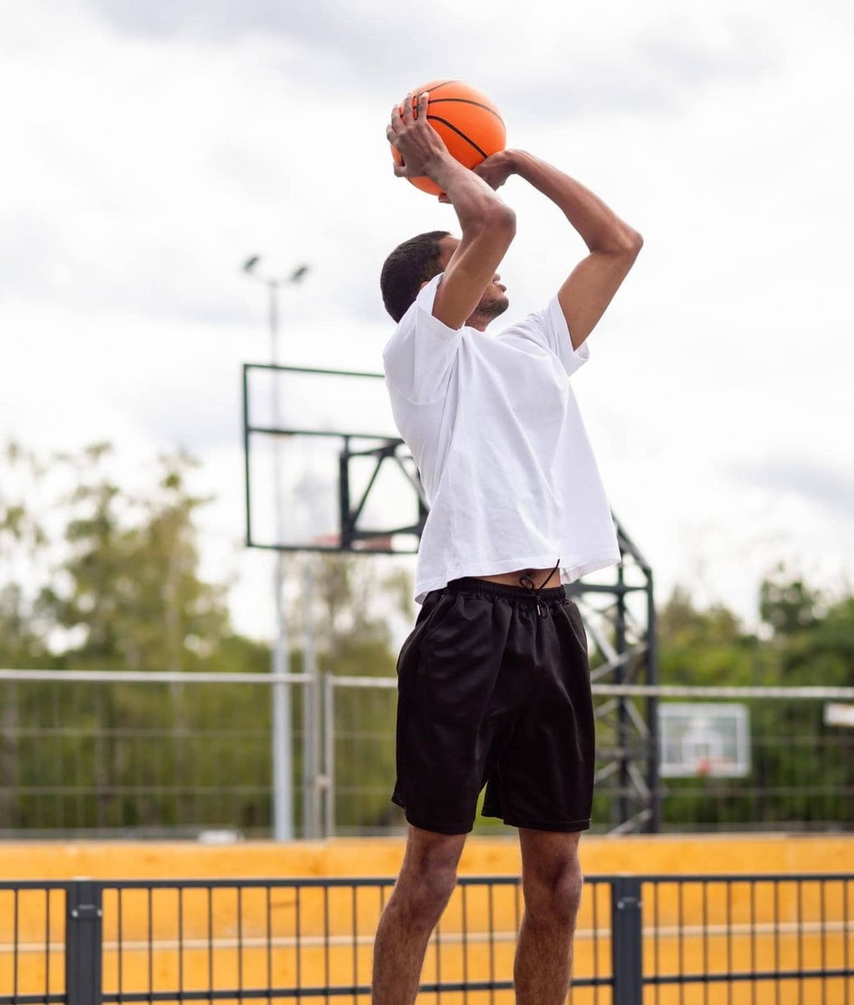 Athlete stretching on outdoor stairs